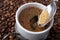 Close up of adding brown sugar in traditional Turkish coffee