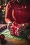 Close-up adult person hands wrapping a Christmas gift