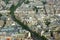 Close up aerial view of Paris rooftops and tree lined streets