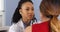 Close up of African American doctor listening to heart and lungs of patient