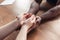 Close up of african-american male and caucasian female hands holding