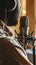 Close-up of African American man podcasting with microphone, intense focus, and studio equipment