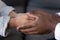 Close up African American man and woman in love holding hands