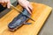 Close-up of African catfish, cooking, cleaning fish. Woman cuts fins off fish before cooking