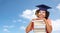 Close up of african graduate student with books