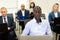 close up of african male manager in suit in meeting room