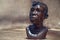 Close up of African traditional wooden Statue figurine on a fur background