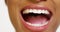 Close up of African woman with white teeth smiling