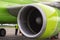 close-up of aircraft engine. green airplane turbine detail. Plane engine and technical staff