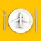 Close up of airplane on plate, knife and fork concept illustration on yellow background, Top view with copy space