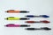 close-up of aligned color pens on a white background