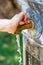 Close up of an Ancient Ornate Fountain Spout Running Water in Vicenza