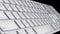 Close-up animation of white buttons of keyboard. Computer keyboard, animation