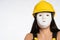 Close up anonymous face of a construction worker. Yellow protective helmet on the head. Occupational Health and Safety.