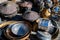 Close up of antique brass jugs and dishes