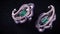 Close up of antique earrings made of platinum, diamonds and giant emerald. Video. Luxury jewelry with gem stones isolated