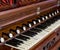 Close-up of antique reed organ harmonium