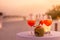 Close-up of aperol spritz cocktail drink, selective focus and details. alcoholic drink refreshment at tropical beach