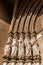 Close-up on the Apostles statues placed on the left side of the Evora Cathedral Portal in Portugal.