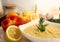 Close-up appetizing lentil porridge in a white dish on a light kitchen countertop. Top down. Healthy eating concept.