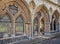 Close up of architectural arches and windows in cloisters at a cathedral