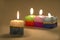 Close-up of an arrangement of burning candles .