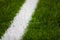 Close-up of artificial turf of soccer pitch. Soccer football field