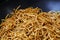 Close up Asian fried noodles in wok pan