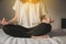 Close up of asian hands woman practices yoga and meditation in the lotus position