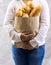 Close up Asian housewife woman hold grocery bread bag