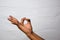 Close up Asian man shows hand gestures it means OK isolated on white background