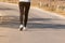 Close up Athlete running woman wearing Exercise pants and running shoe on the road,Runner woman traning in the morning.Walking for