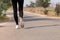 Close up Athlete running woman wearing Exercise pants and running shoe on the road,Runner woman traning in the morning.Walking for