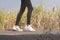 Close up Athlete running woman wearing Exercise pants and running shoe on the road,Runner woman traning in the morning.Walking for