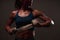 Close up of athletic healthy lean tone top body of asian woman holding white strap with both hands preparing for training or