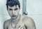 Close up Attractive Muscular Man Taking Shower