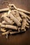 Close up of Ayurvedic herb Liquorice root,Licorice root, Mulethi or Glycyrrhiza glabra root on a wooden surface is very much benef