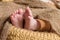 A close-up of baby feet. focused on foot