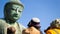 Close up back side of asian tourist looking daibutsu buddha stat