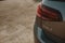 Close up back view of Volkswagen Golf 7, during sunset in the countryside