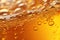 Close up background of beer with bubbles in glass. Pouring beer with bubble froth in glass for background on front view wave curve