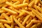 Close up background of crinkle cut fried chips