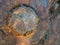 Close up background image of rusty corroded iron machinery with a rough cracked surface