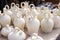 Close-up background of white clay jugs, traditional Spanish home utensils