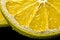 Close up background of yellow fresh lemon slice