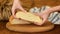 Close-up, Baker Is Controlling A Freshly Baked Bread. Bread production.