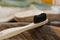 Close up bamboo toothbrushe, eco, zero waste wooden brush on abstract background. Zero waste concept. Copy space