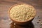 Close up of Barley in a Earthen Bowl on Wooden Background