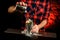 Close-up of bartender adding sugar powder to steel glass.