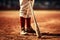 Close-up baseball player\\\'s bat and legs on baseball field. Generative AI